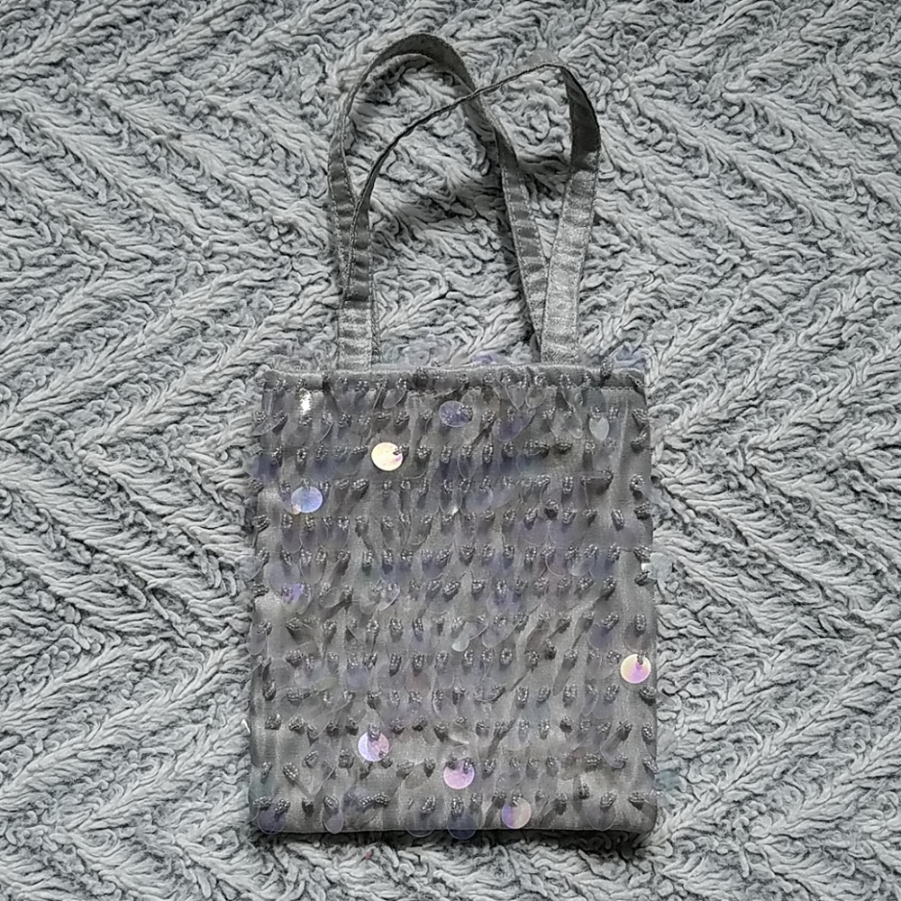 Gray cloth handbag with big iridescent sequins